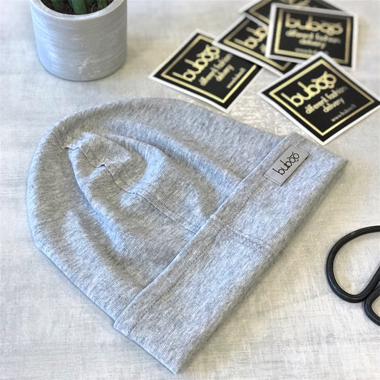 Vaikiška kepurė TRENDY šviesiai pilka blizganti