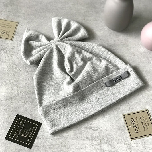 Stilinga kepurė mergaitei su kaspinu FASHIONISTA  blizganti (pilka)